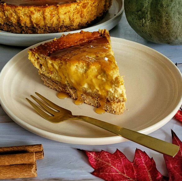 picture of pumpkin cheesecake slice with autumn elements