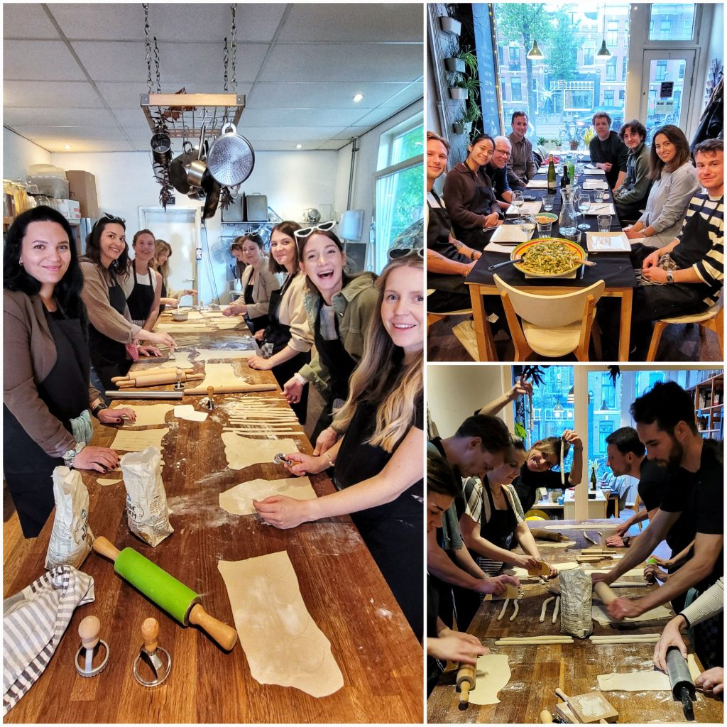 Workshop participants proudly displaying their handmade pasta creations